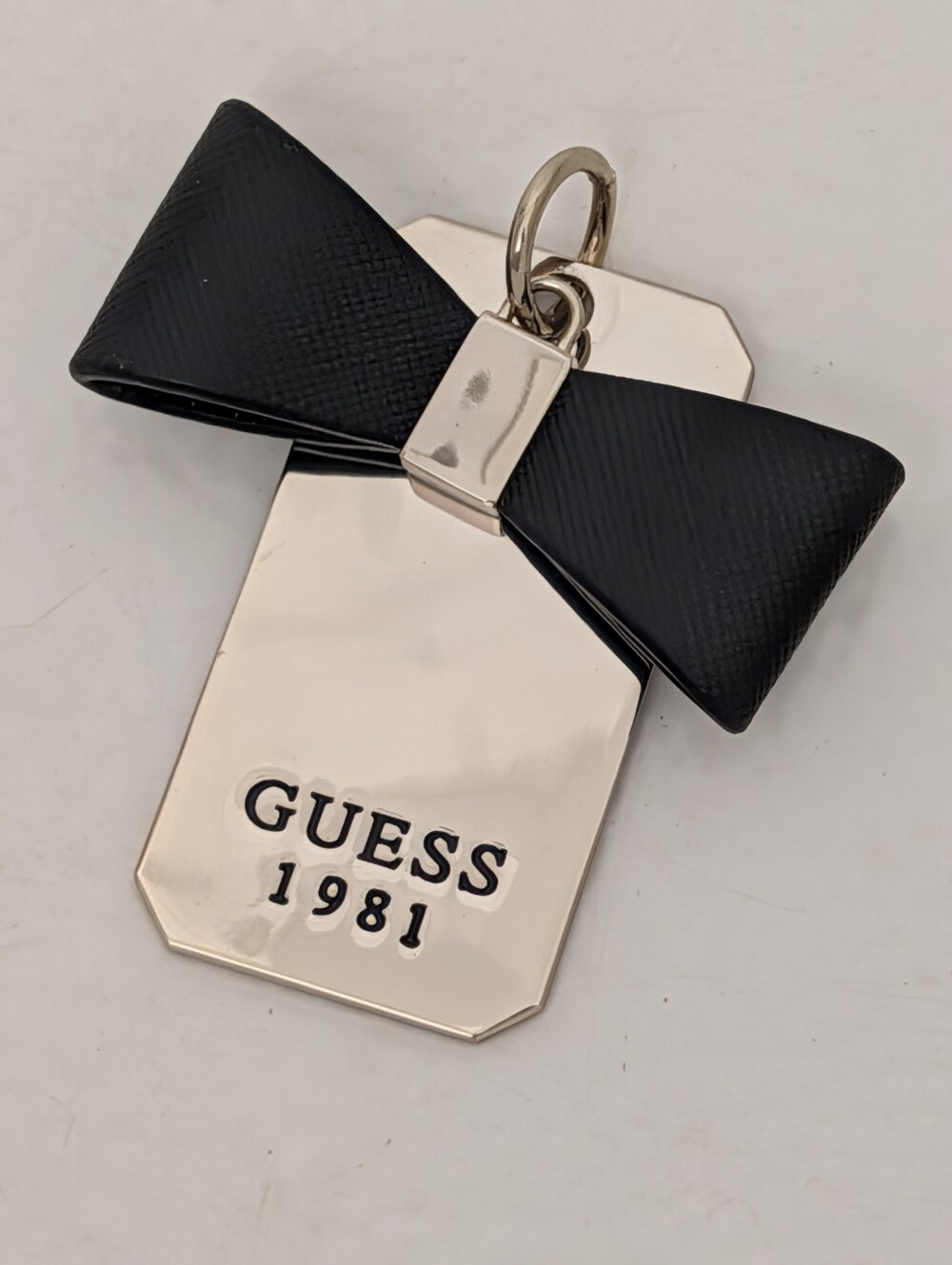 GUESS Black Bow and Silver Tag Pendant Can Be Used W/Key Ring Or Add To Bagcharm